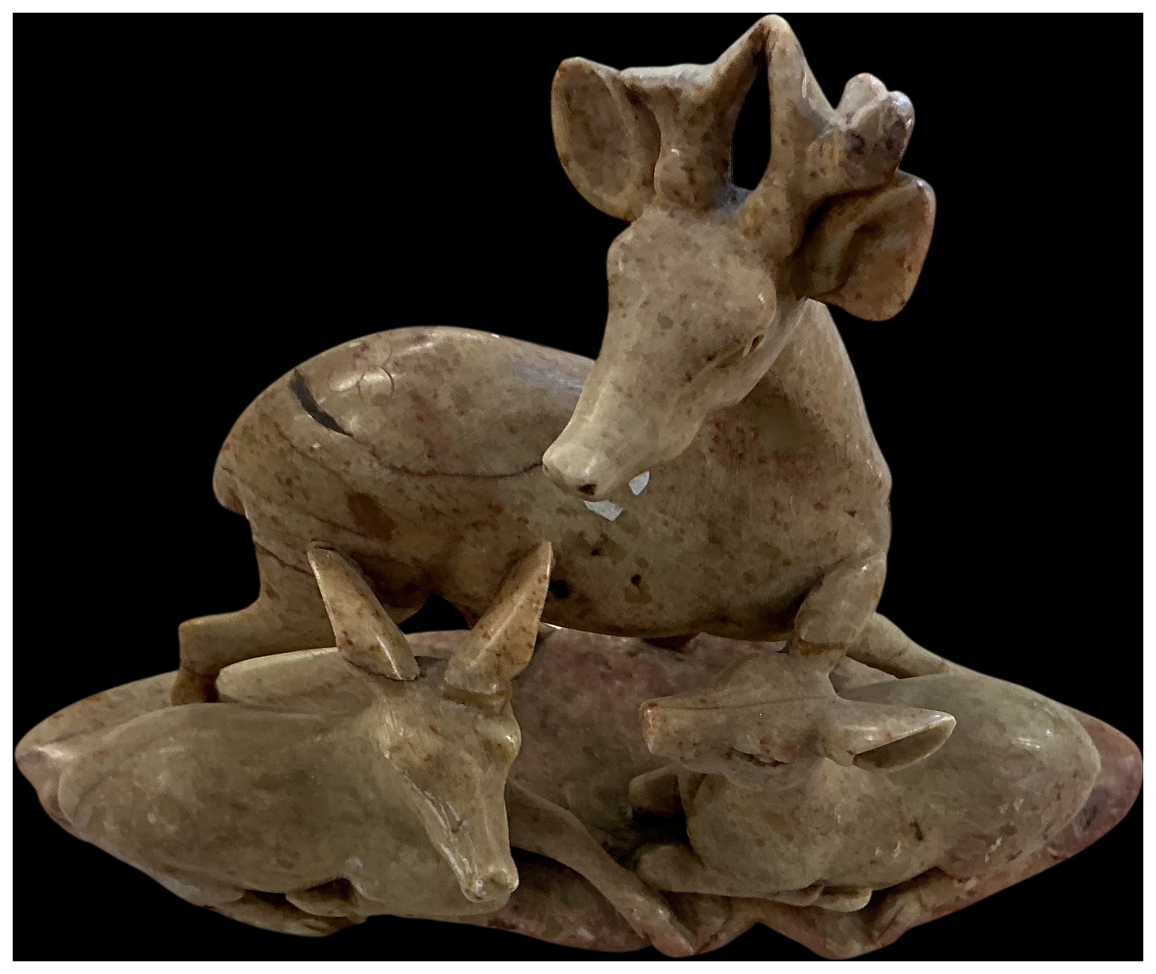 A Hand-Carved Soapstone Deer Family Group