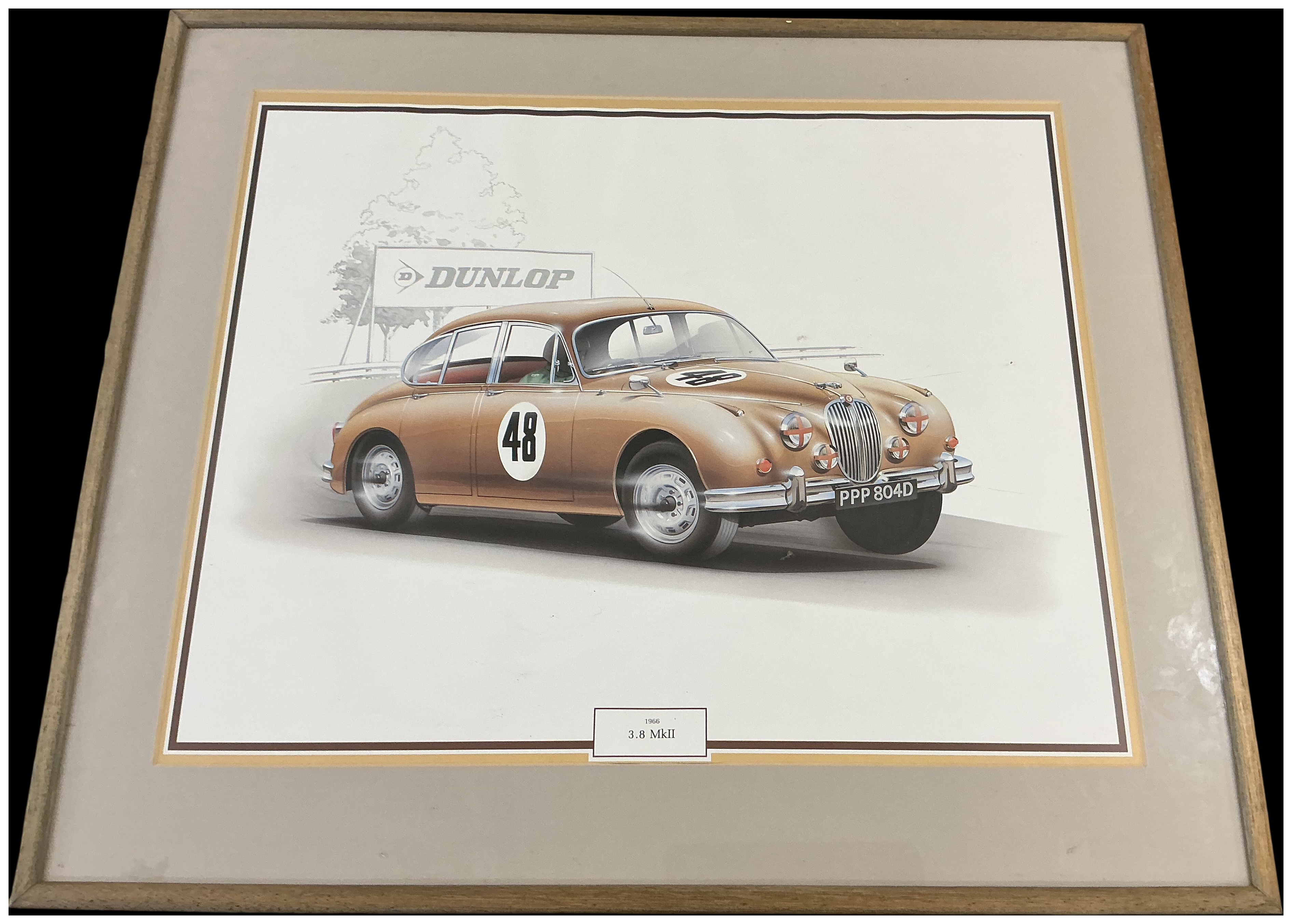 A Framed Print Depicting a 1966 Jaguar 3.8 MkII Racing Car