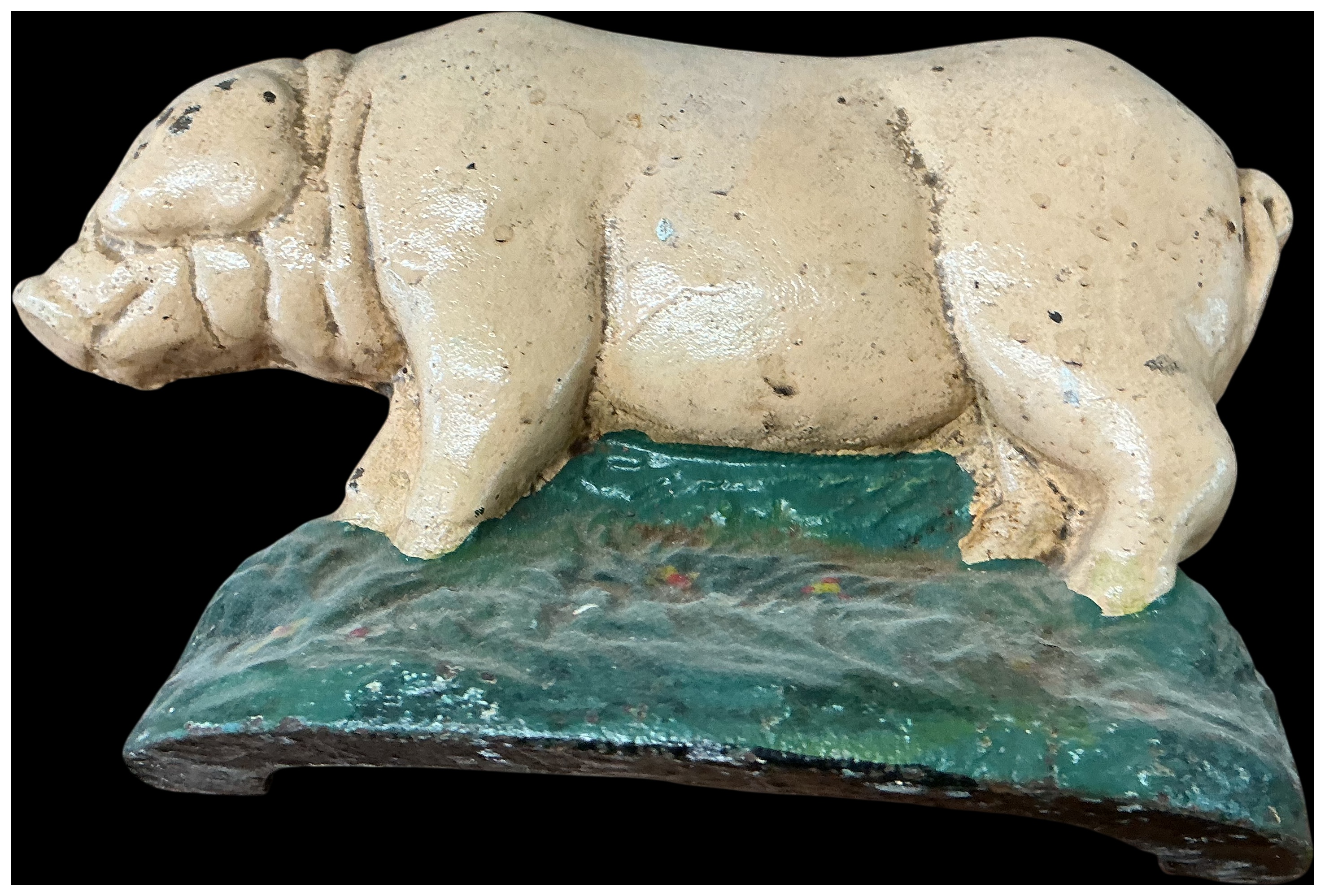 A Painted Cast Iron Pig Doorstop