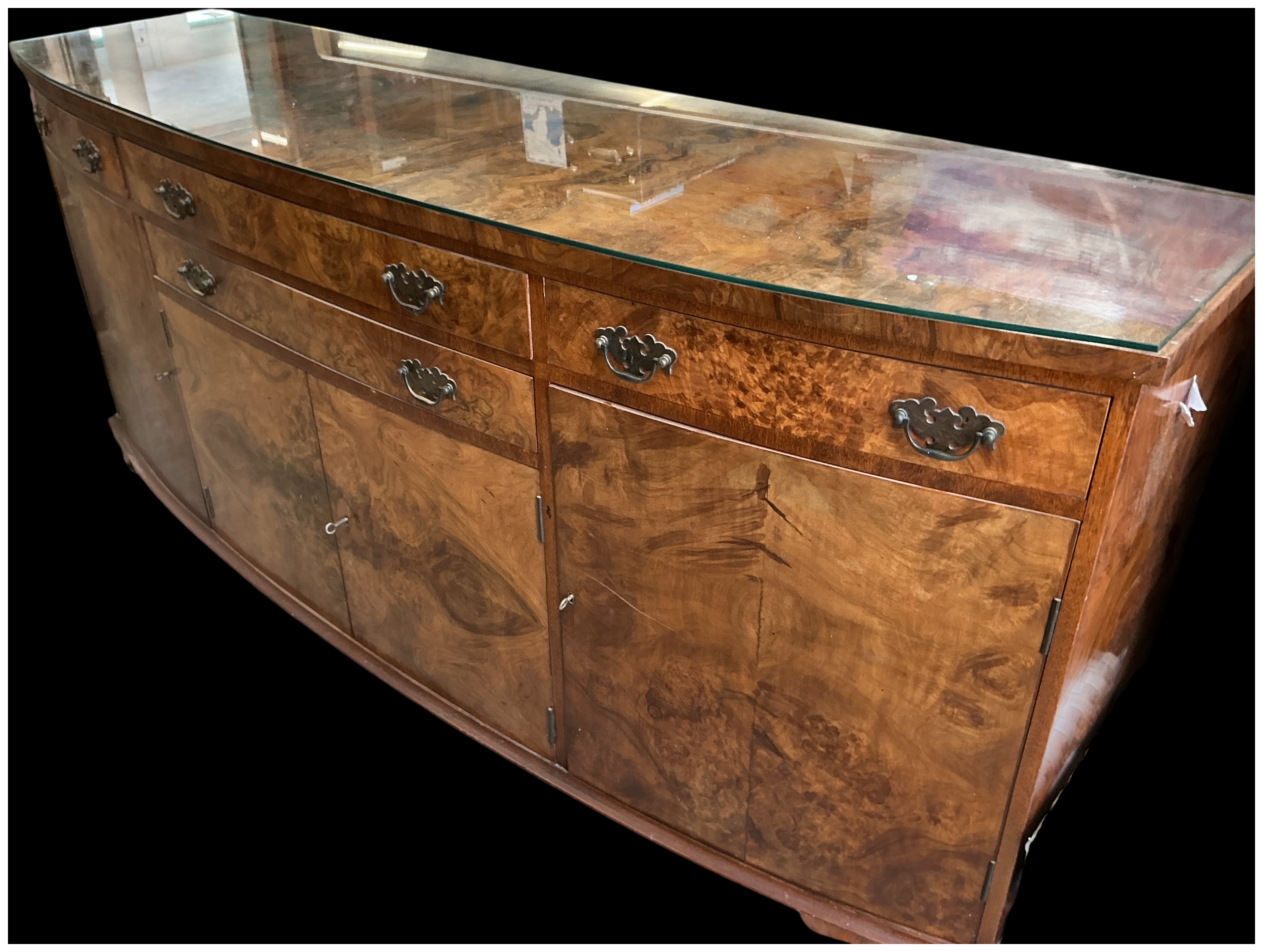 An Early 20th Century Burr Walnut Sideboard with Five Drawers and Three Cupboards