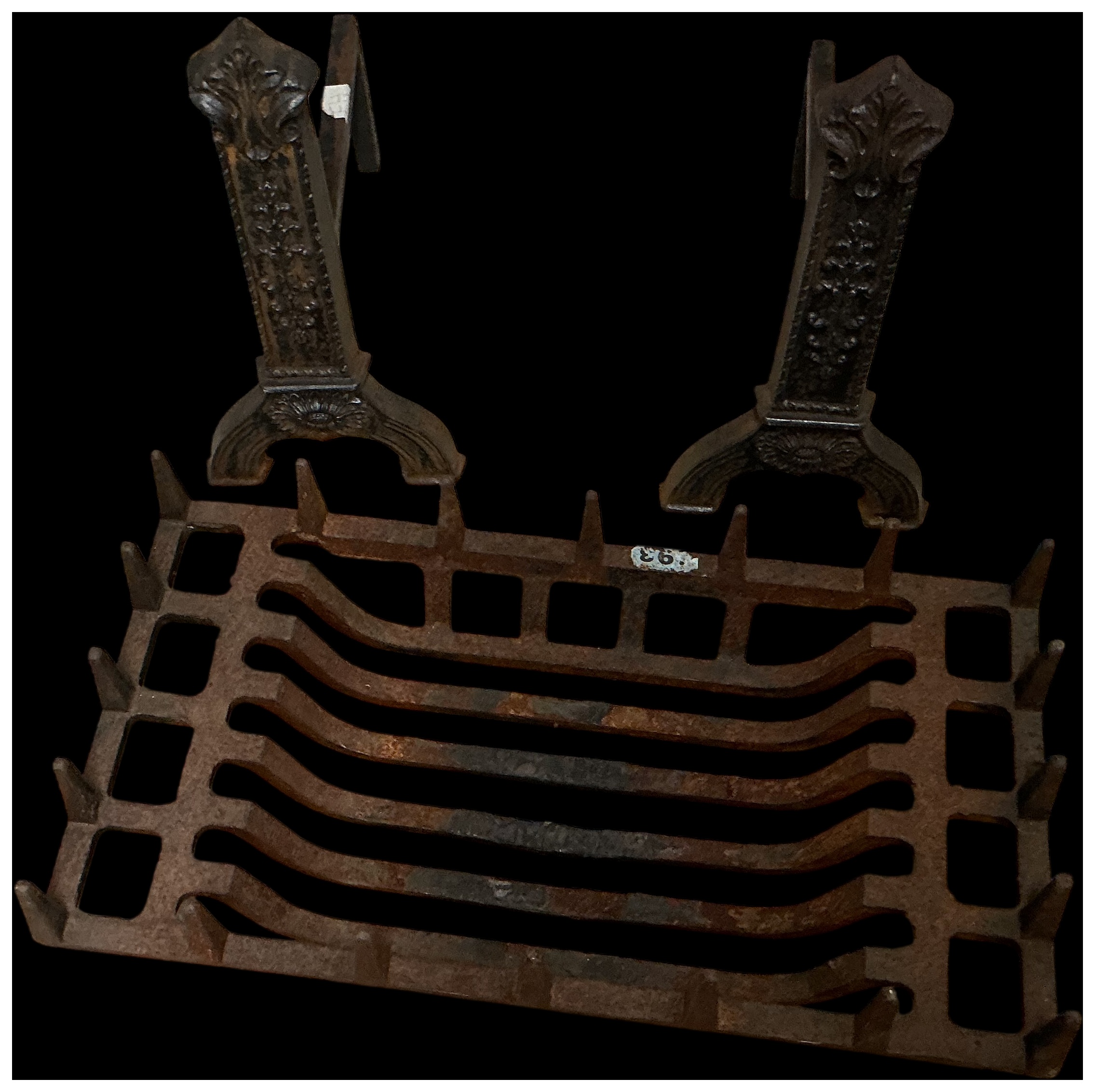 A Cast Iron Fire Grate and a Pair of Matching Fire Dogs