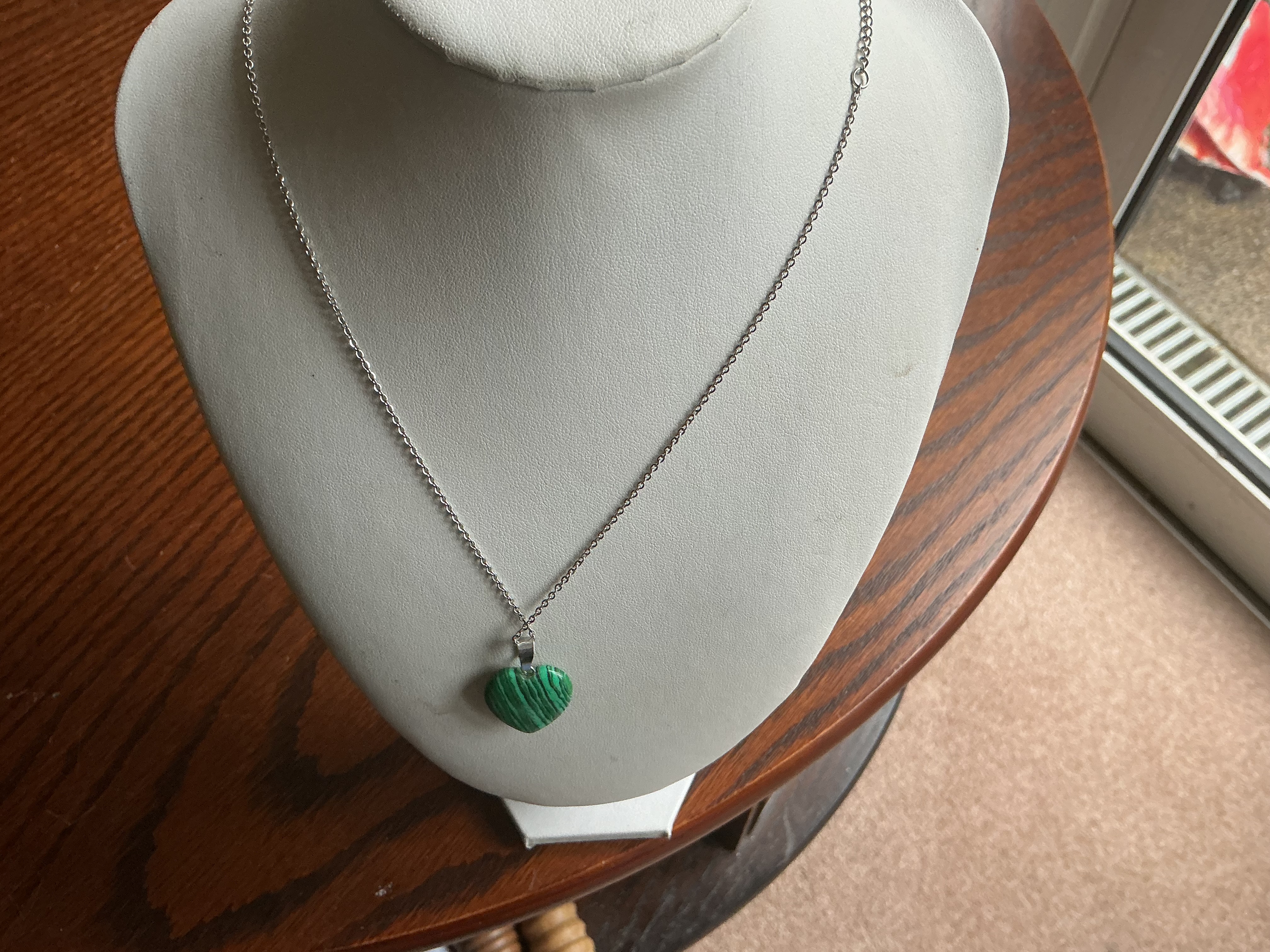September.A Silver-Toned Malachite Heart Pendant Necklace