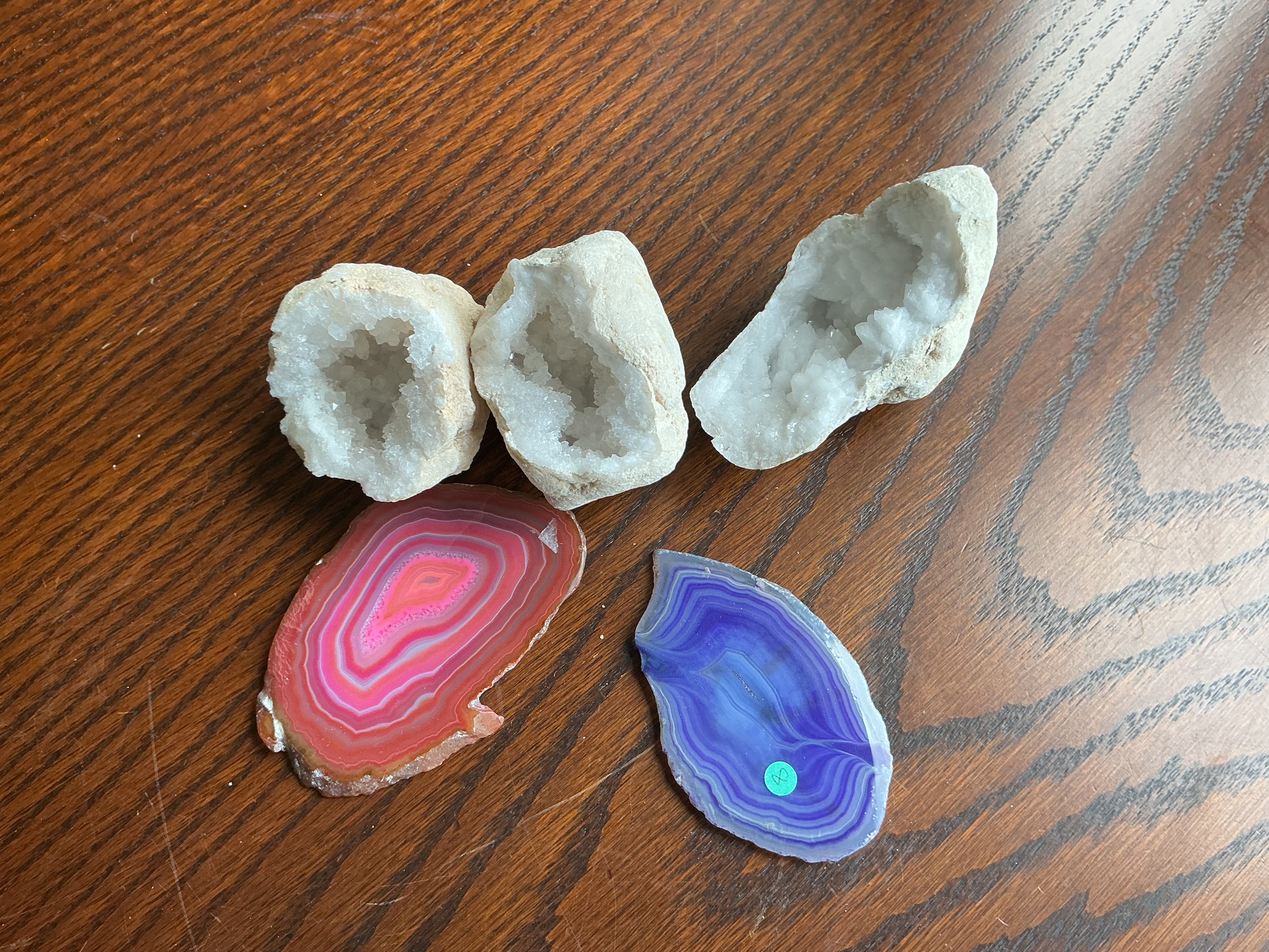 A Collection of Natural Quartz Geodes and Polished Agate Slices
