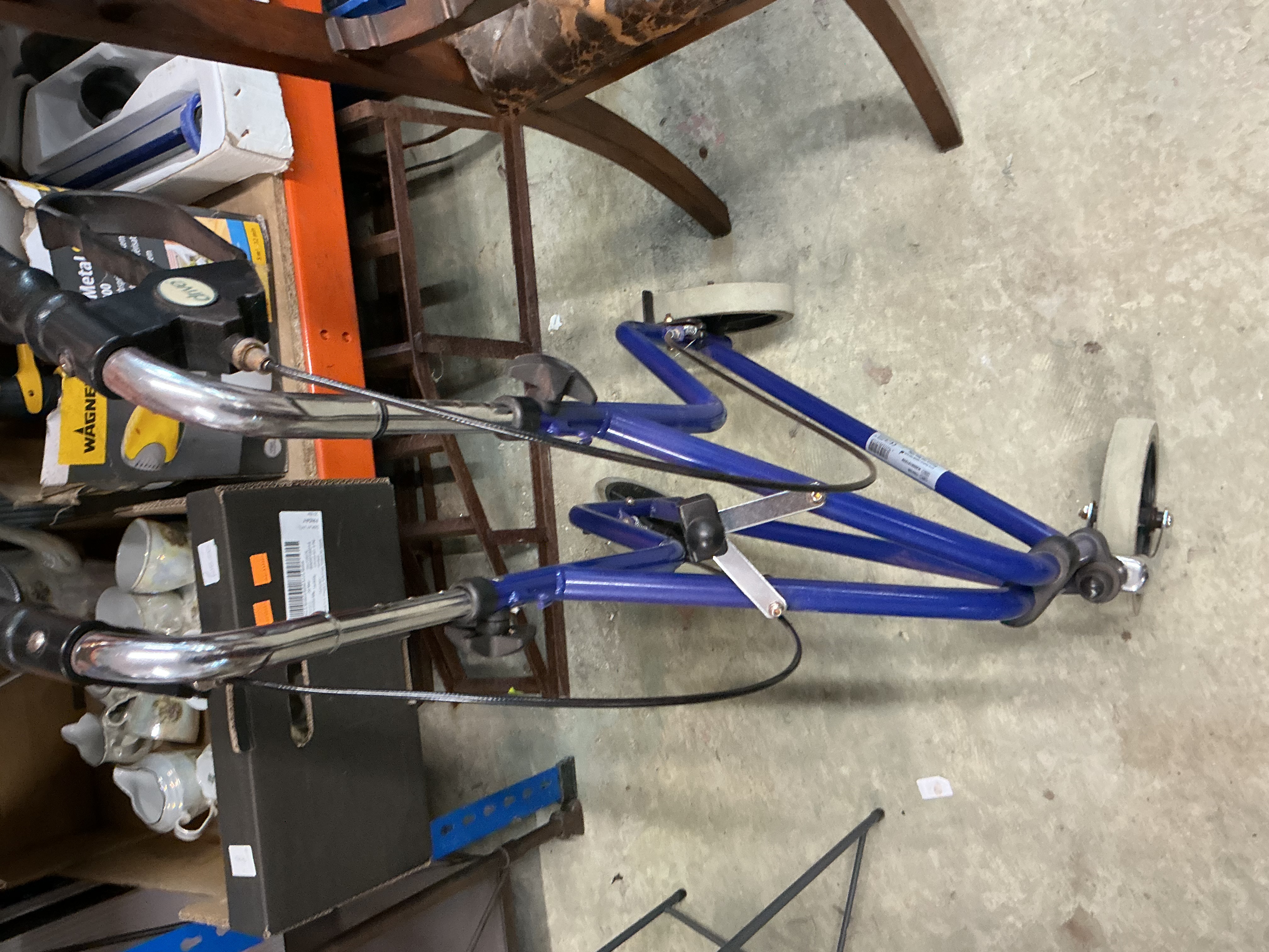 A Drive Three-Wheeled Folding Rollator Walker