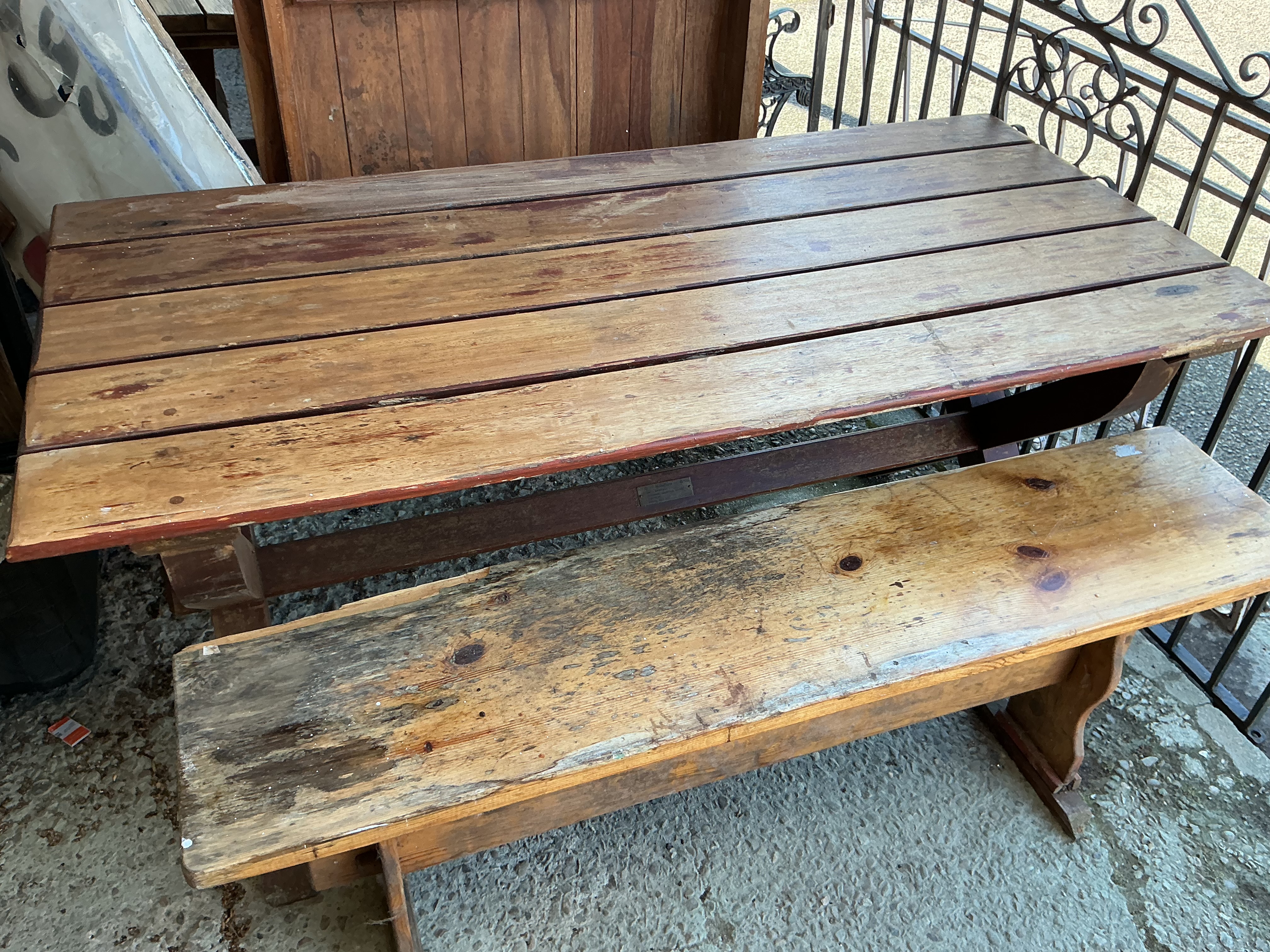 A Rustic Pine Trestle-Base Farmhouse Dining Table and Matching Bench