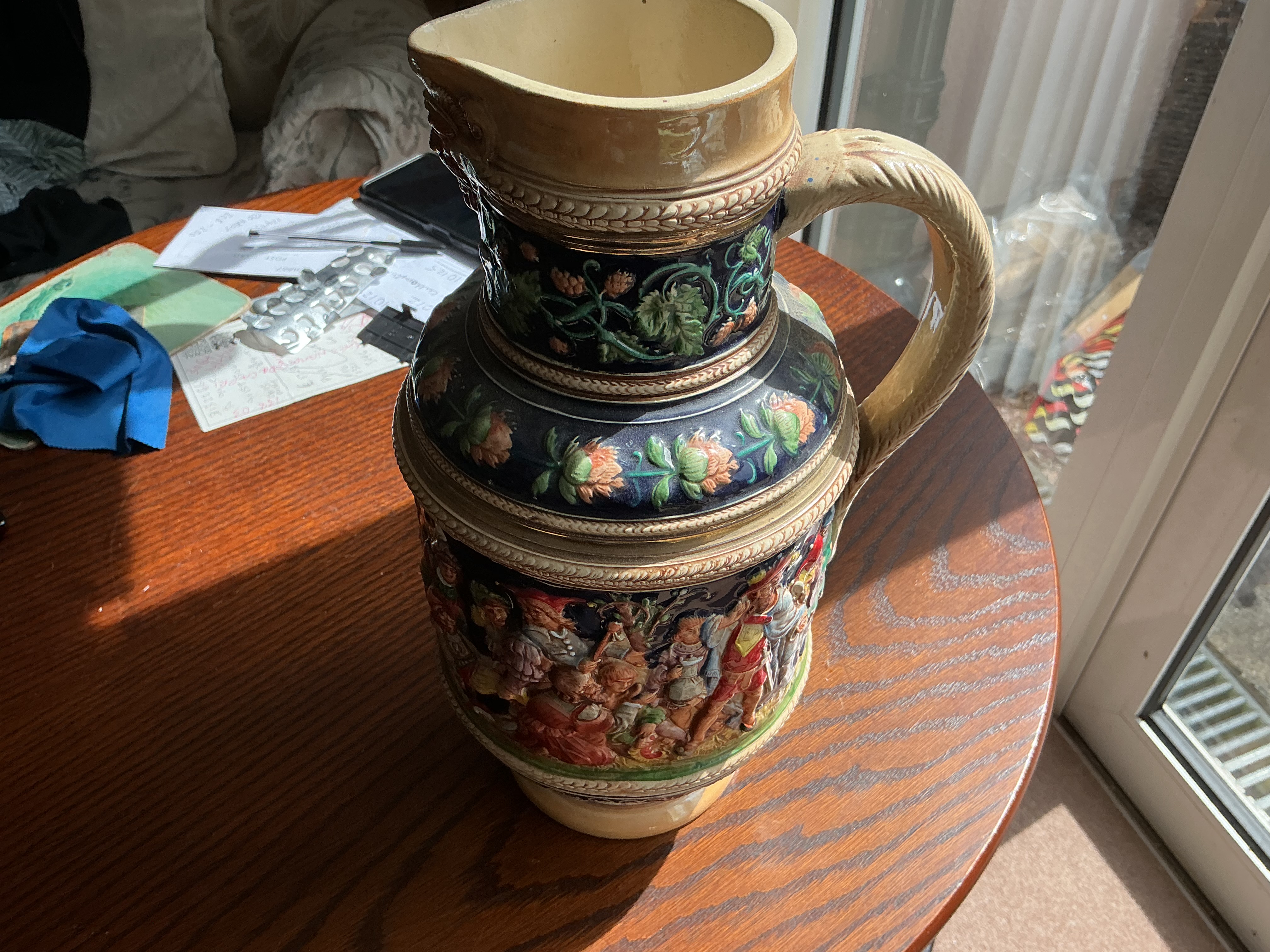 A Large German Relief-Moulded Salt-Glazed Stoneware Pitcher