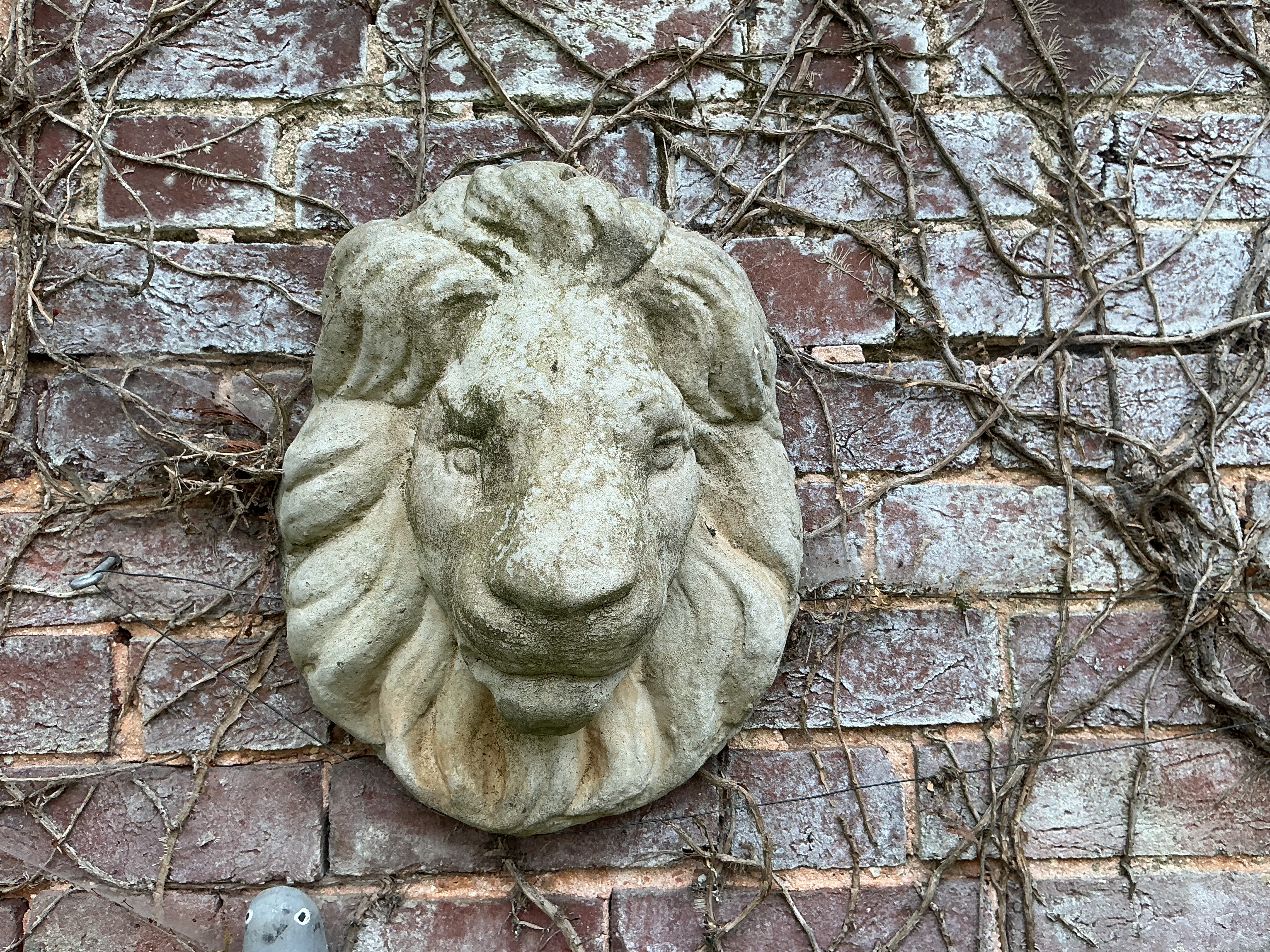 A Cast Stone Garden Lion Wall Plaque