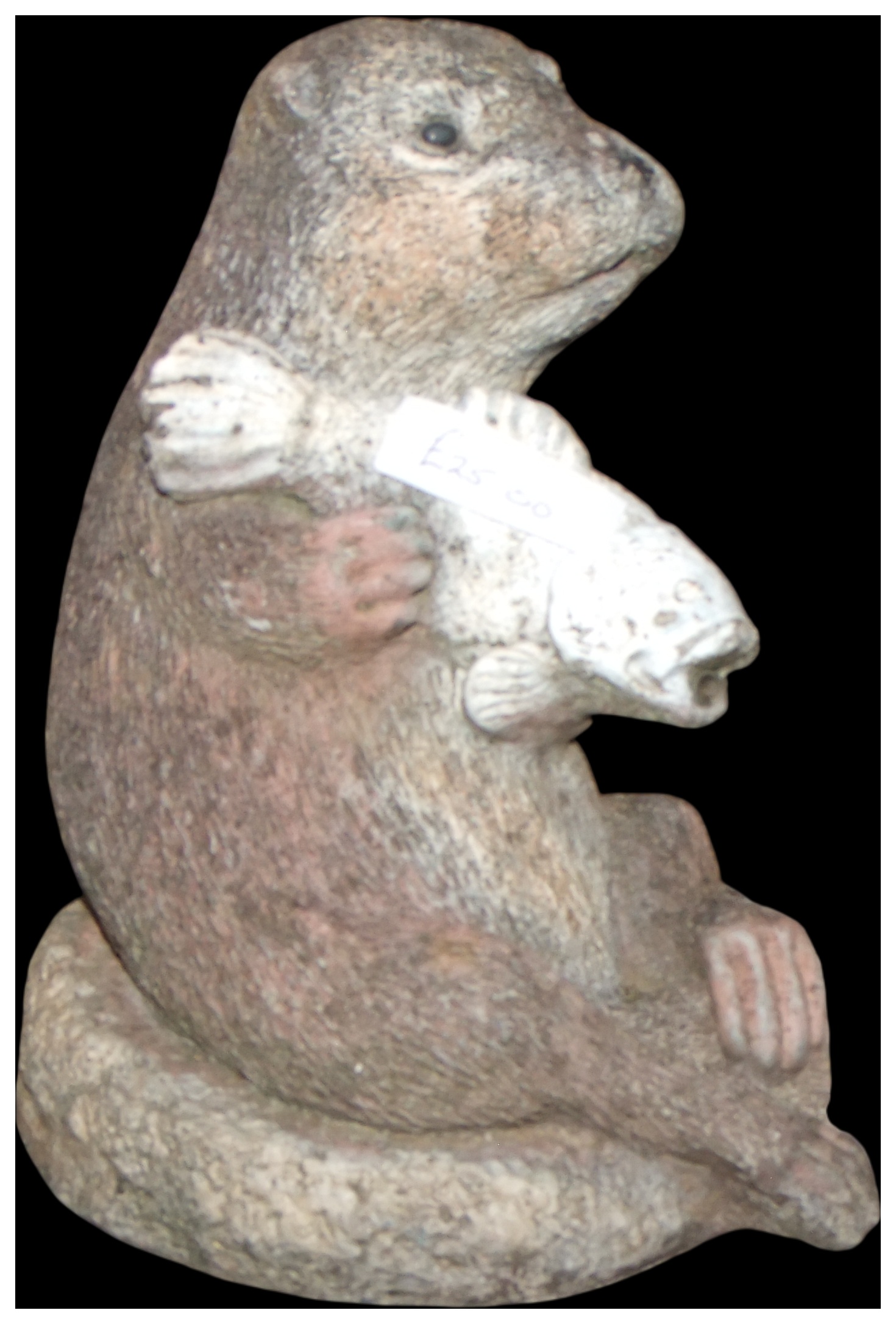 No reserve. A Weathered Cast Stone Garden Ornament of an Otter on a Staddle Stone Base