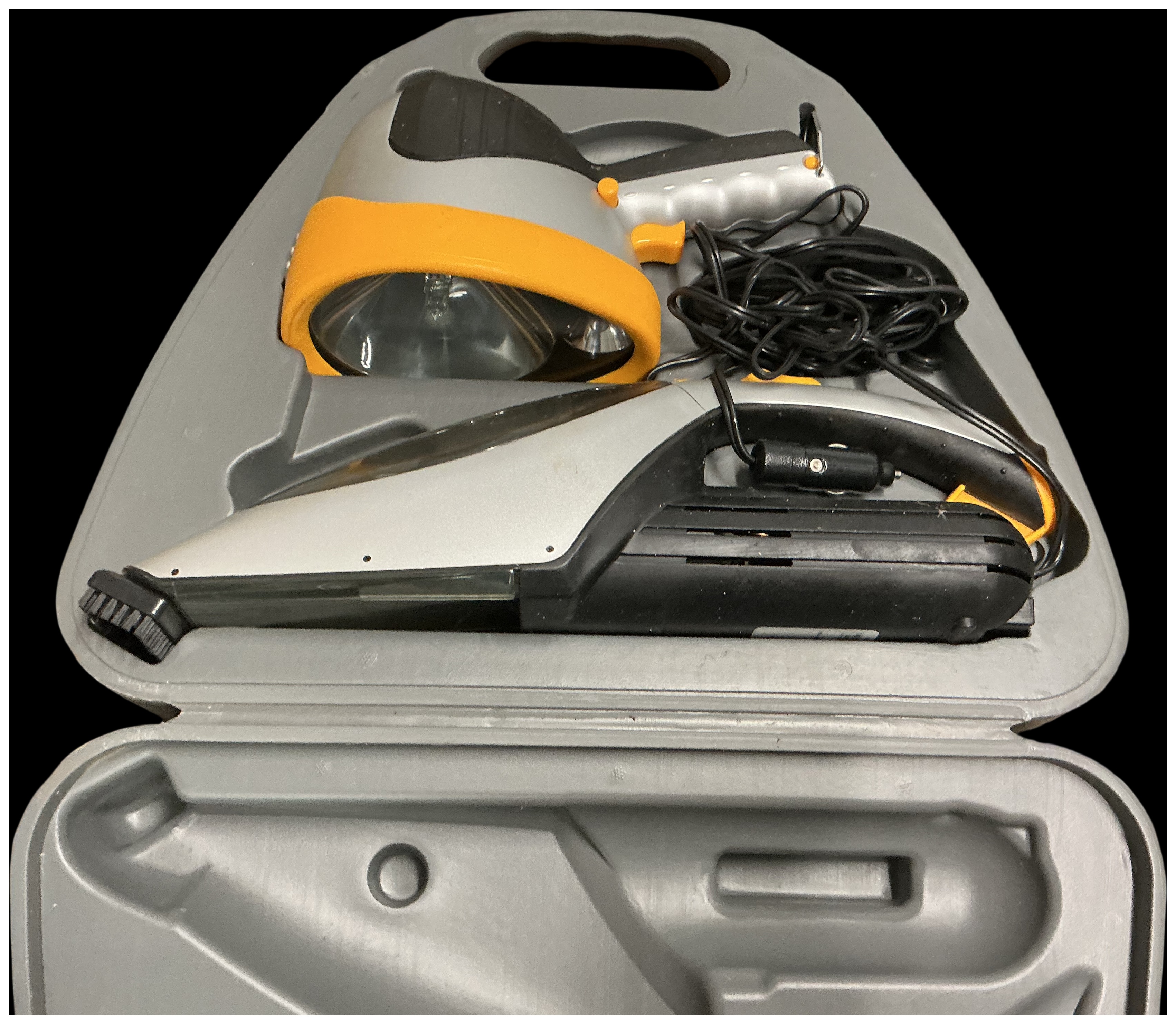 A 12V Automotive Accessory Kit with Spotlight and Vacuum Cleaner