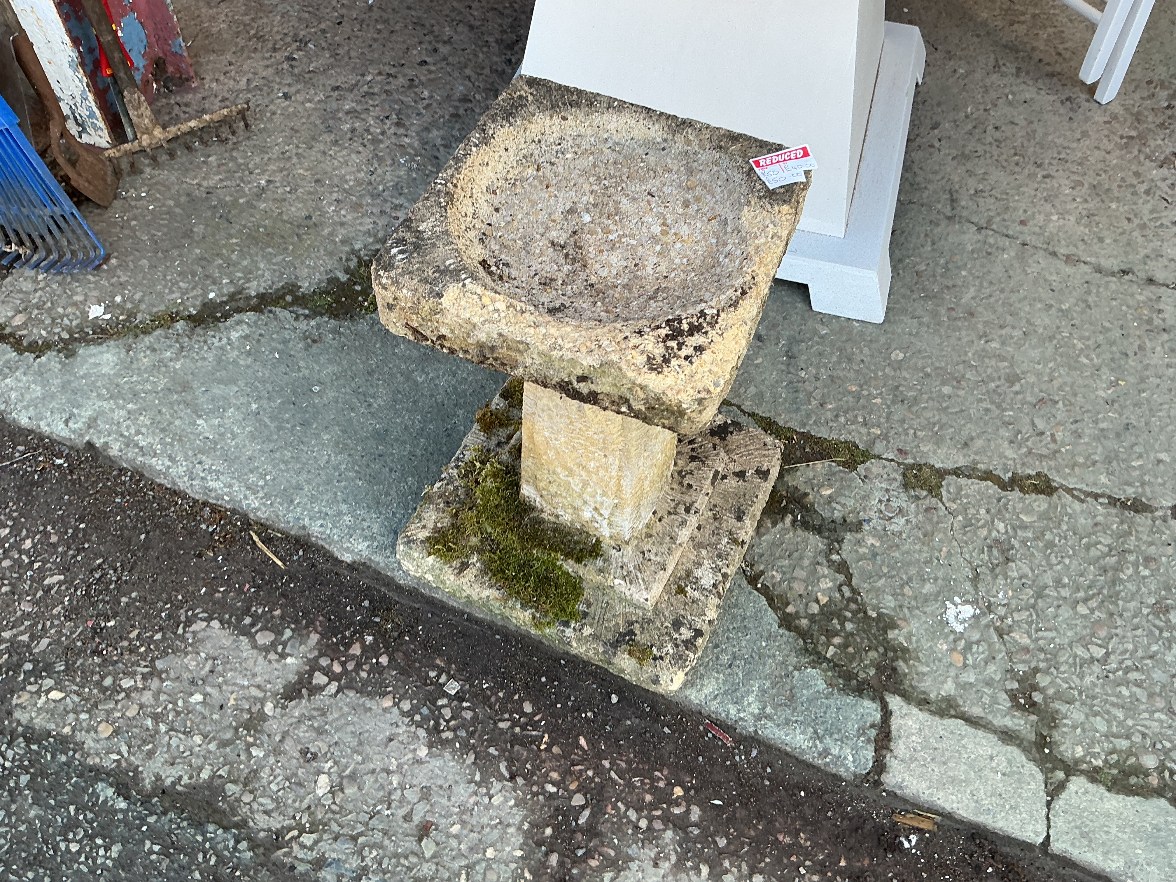 A Weathered Composite Stone Garden Bird Bath of Square Form