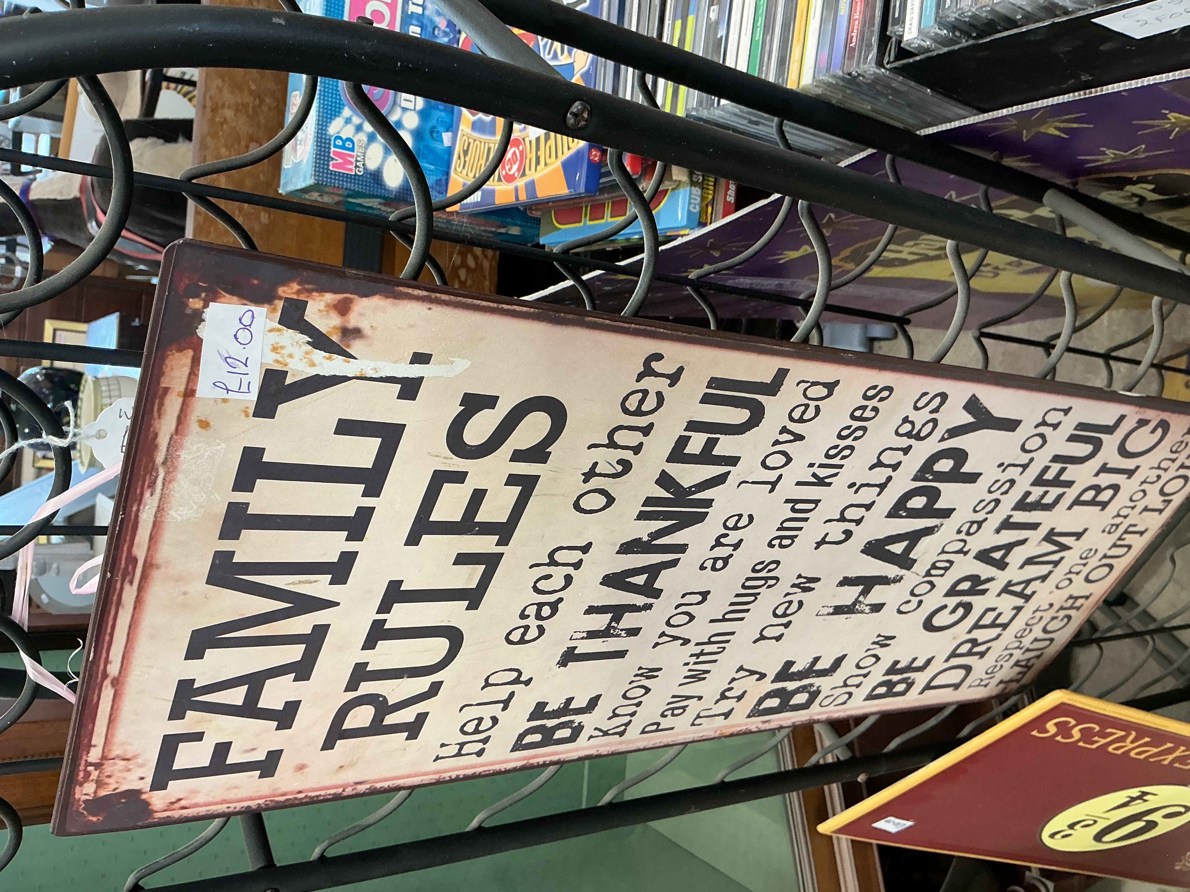 A Contemporary Printed Tin Family Rules Wall Plaque