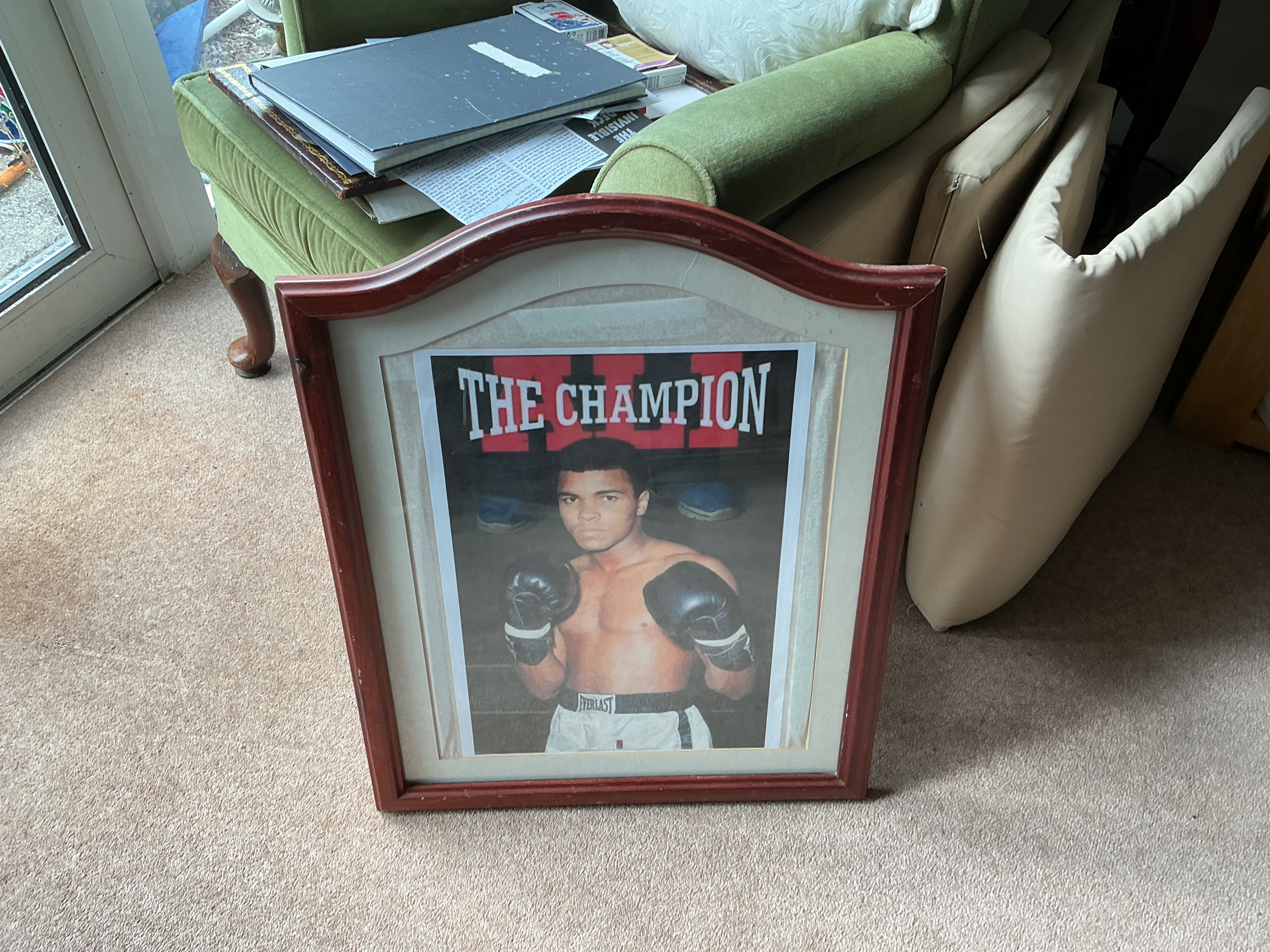A Framed Muhammad Ali The Champion Memorabilia Poster
