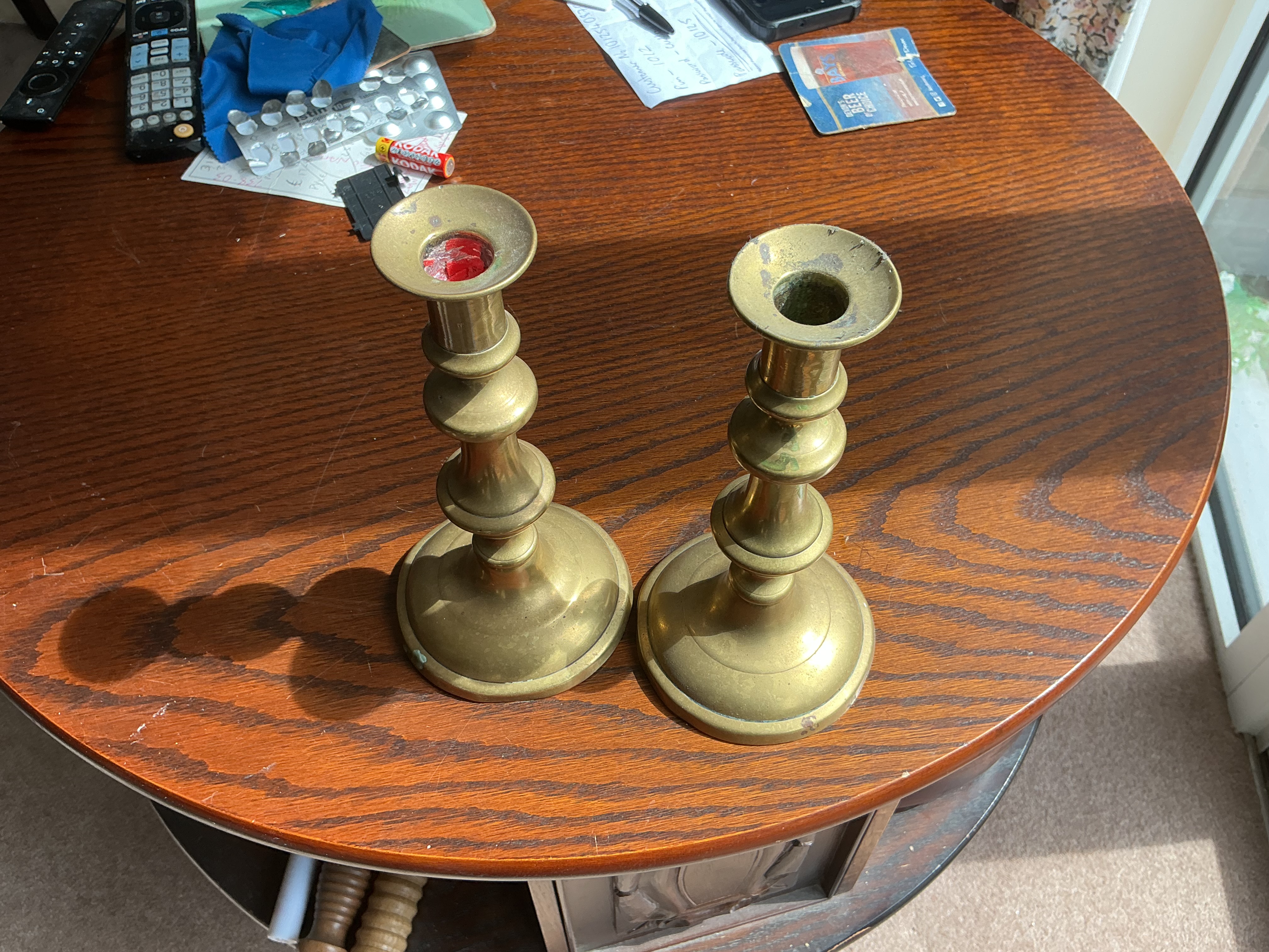 A Pair of Georgian Style Cast Brass Candlesticks