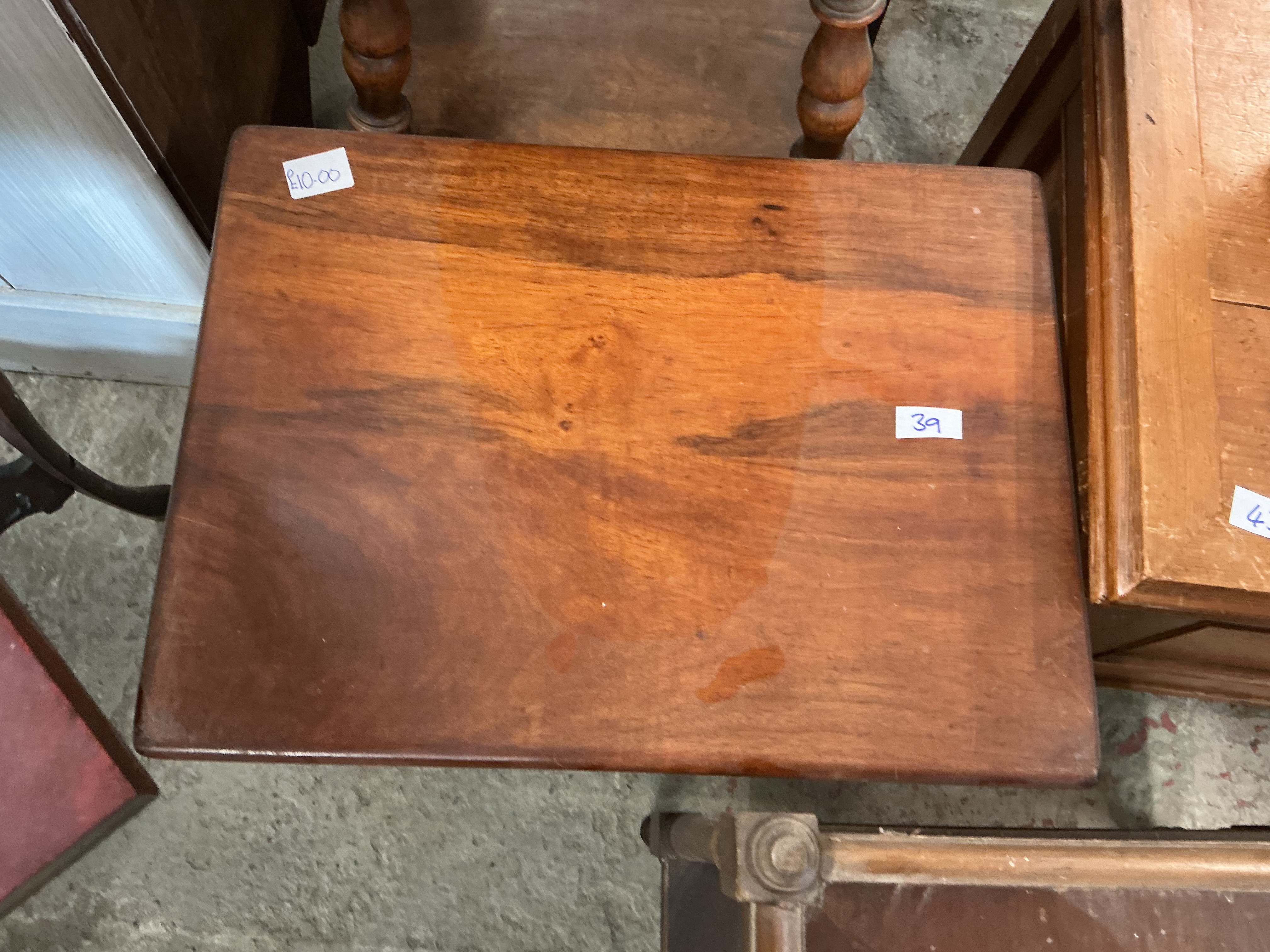 A Late 19th or Early 20th Century Stained Hardwood Side Table