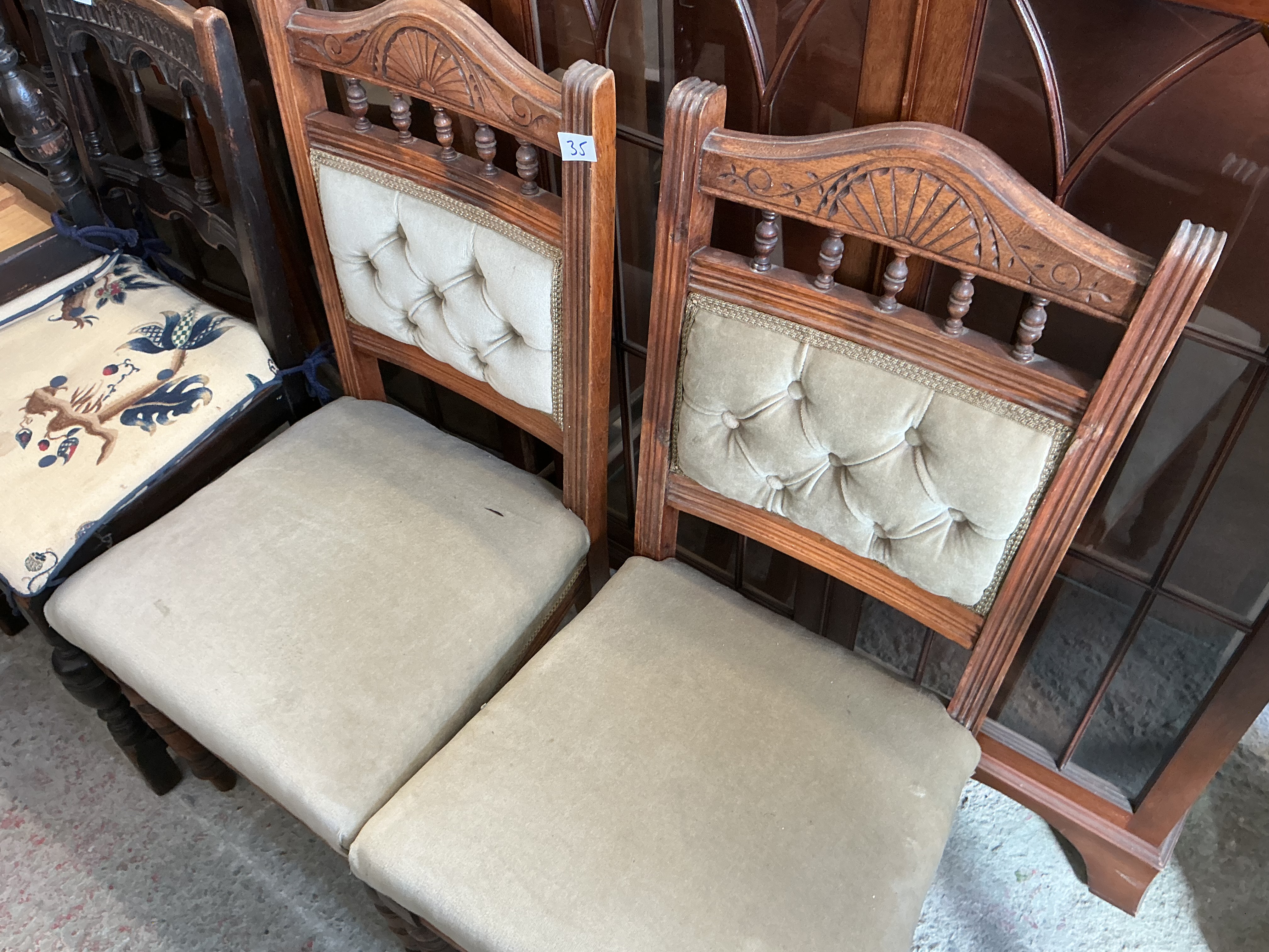 A Pair of Victorian Style Carved Hardwood Side Chairs with Tufted Upholstery