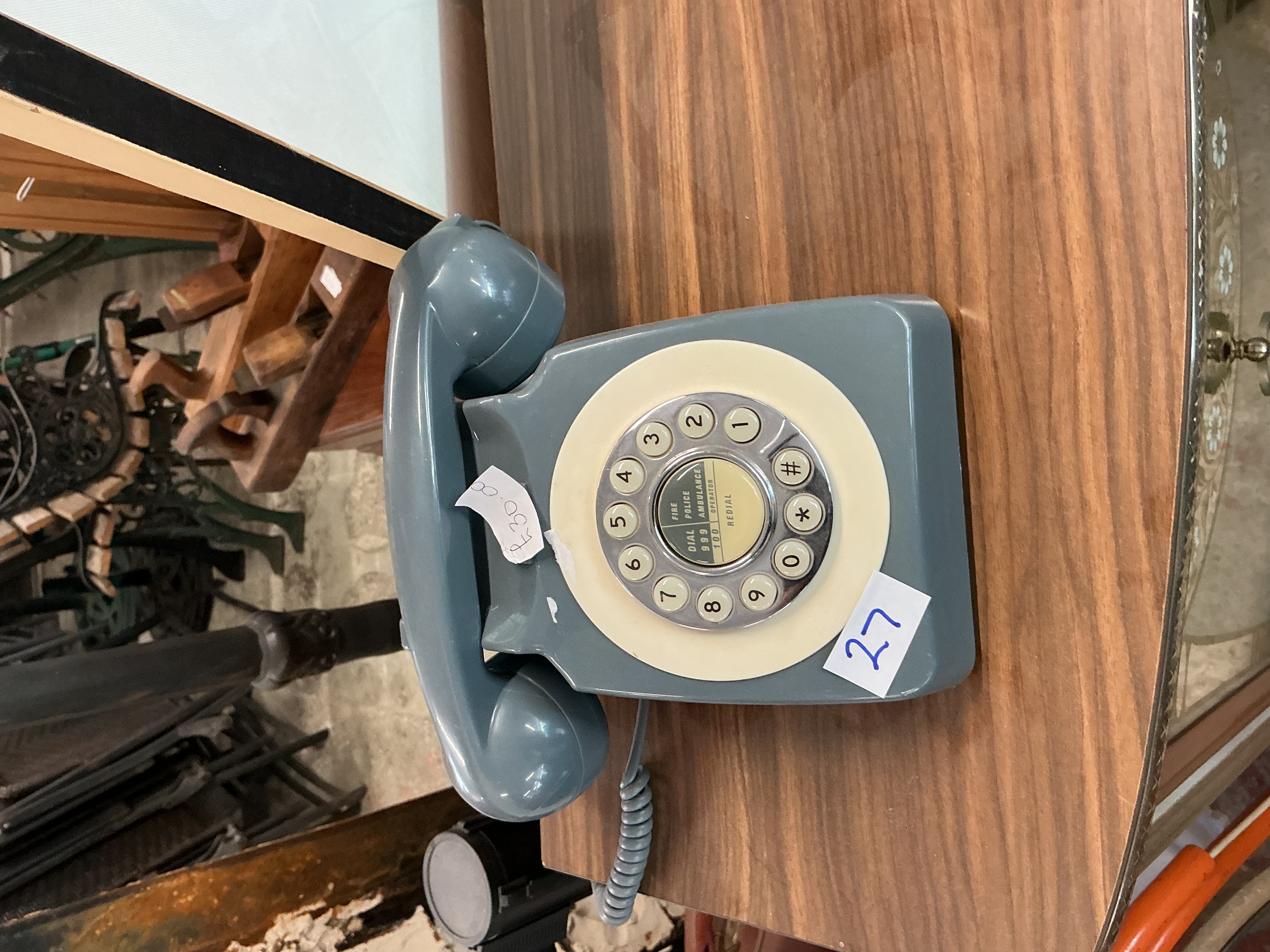 A Retro-Style Push-Button Telephone in Petrol Blue