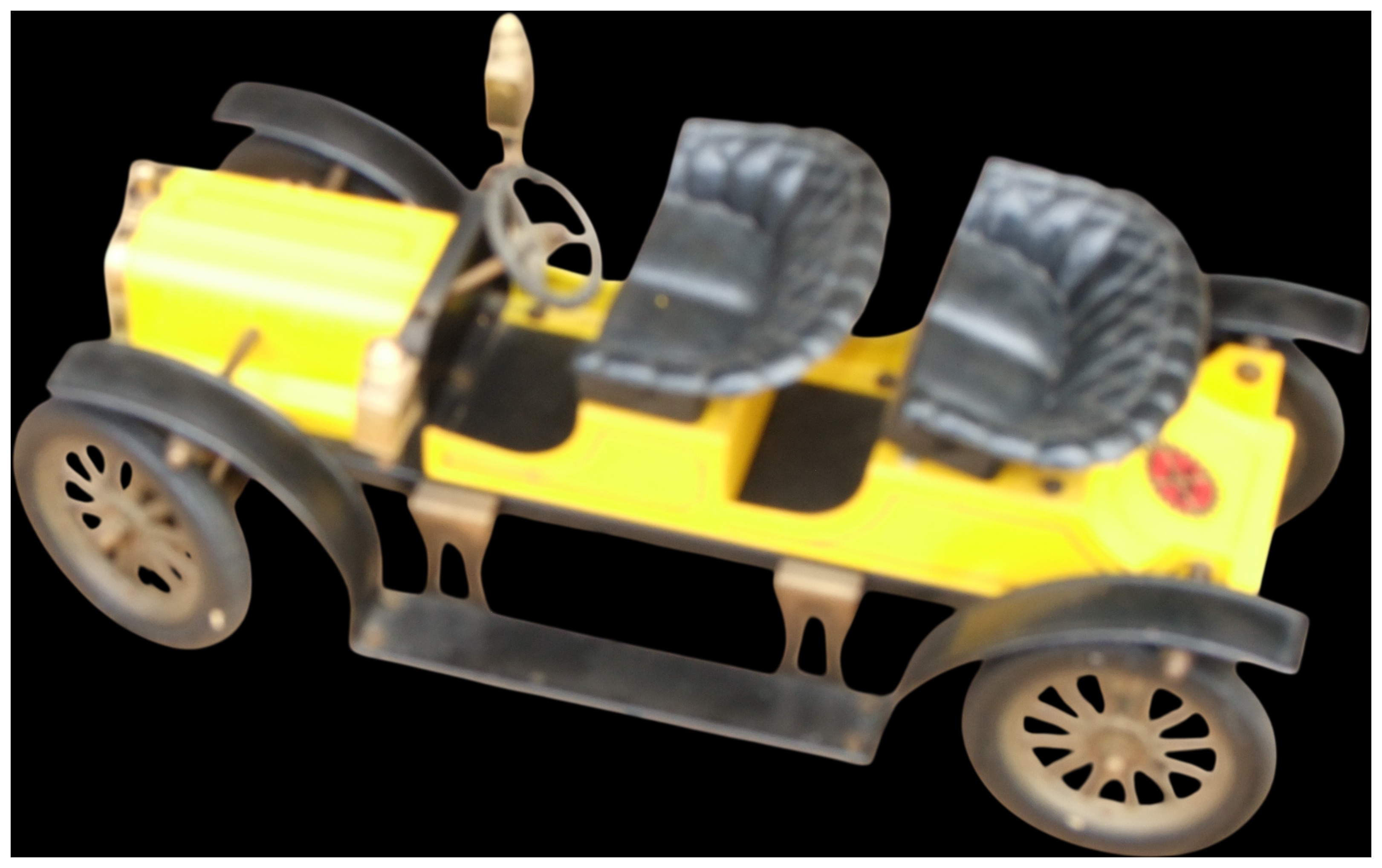 No reserve.Vintage tinplate open top four-seater tourer toy car