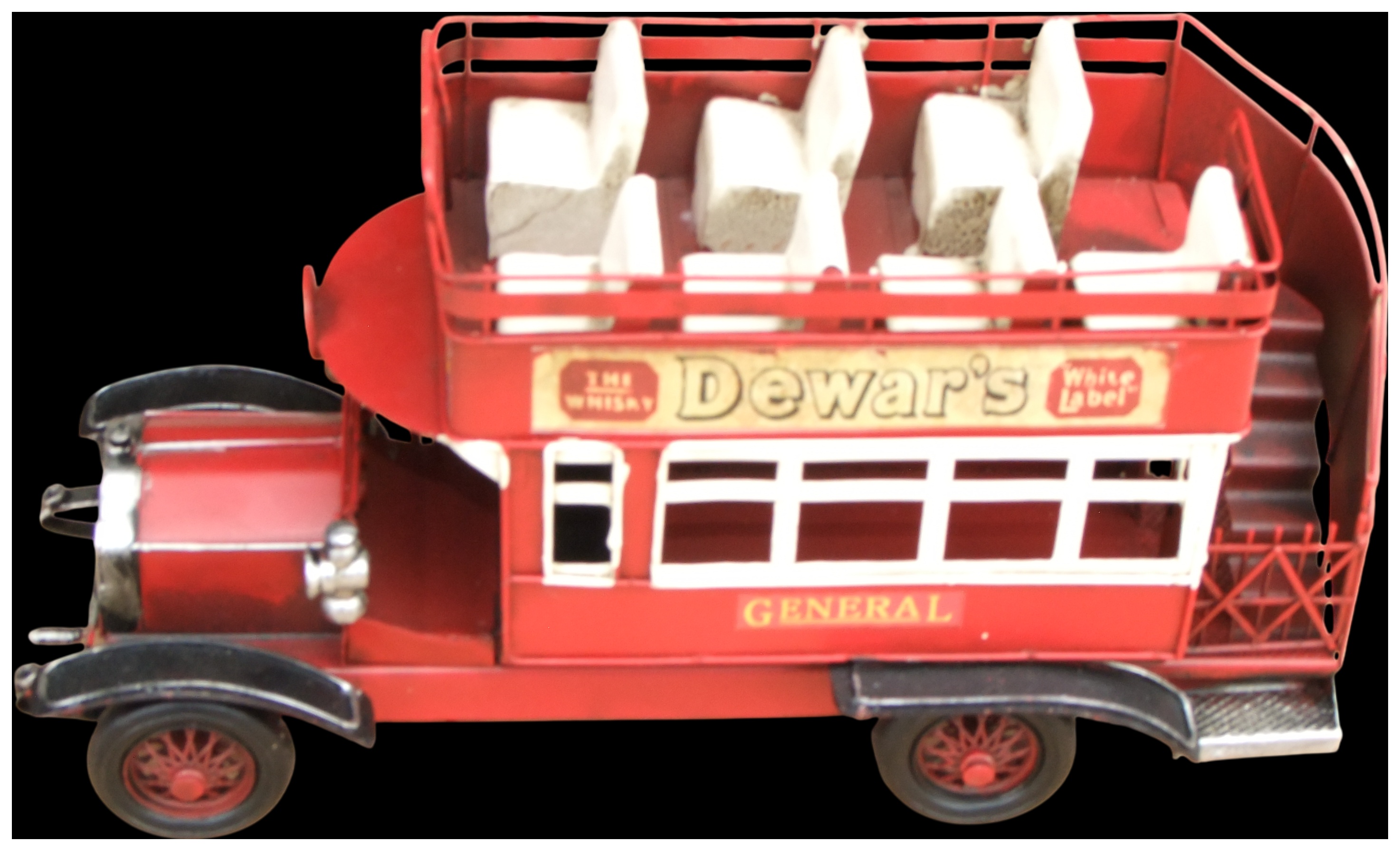 No reserve. A decorative tinplate model of a London General Omnibus Company B-type open-top bus with Dewars advertising