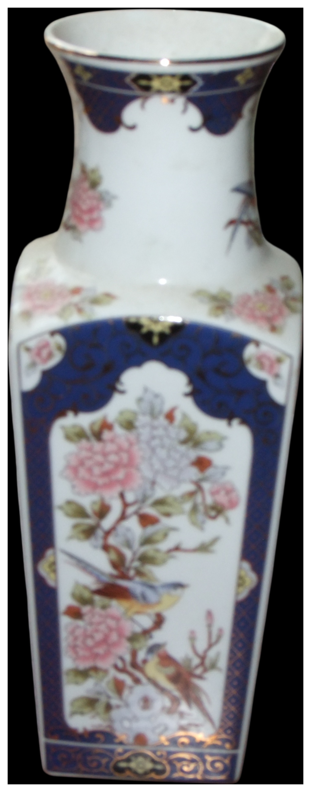 A Japanese porcelain square-section baluster vase with bird and floral decoration. No reserve.