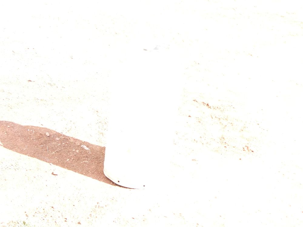 Lot 125: A White Cylindrical Industrial Container