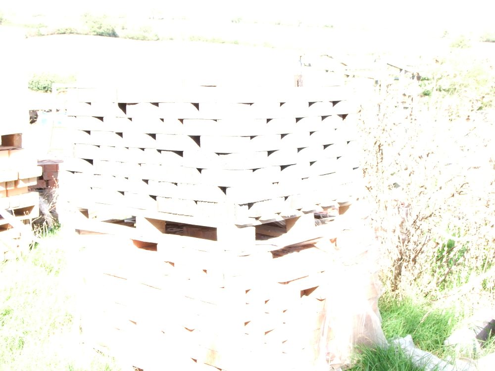 Lot 74: A Pallet Lot of Reclaimed Red Clay Bullnose Coping Bricks