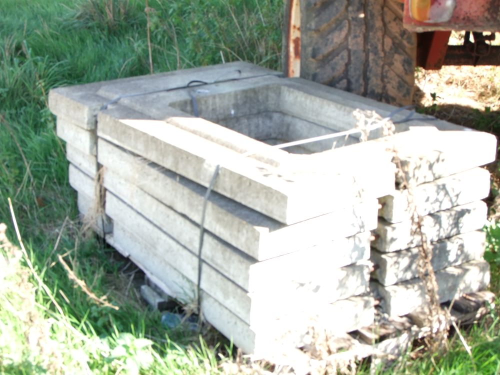 Lot 63: A Group of Precast Concrete Catch Basin Risers and Gully Surrounds