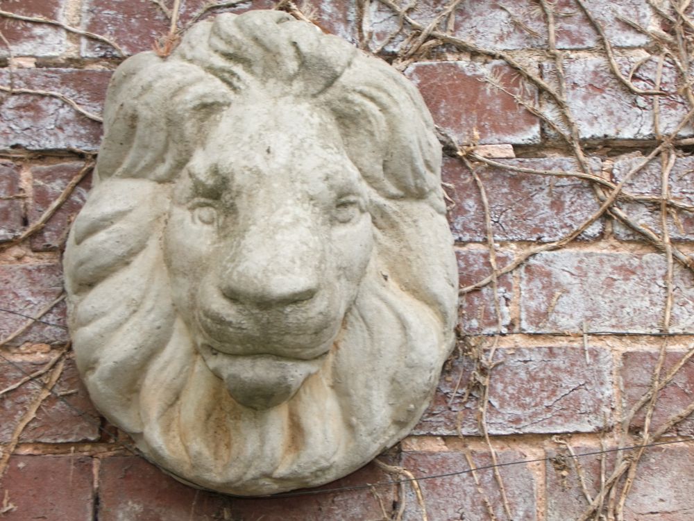 Lot 50: A Large Reconstituted Stone Lion Mask Wall Plaque