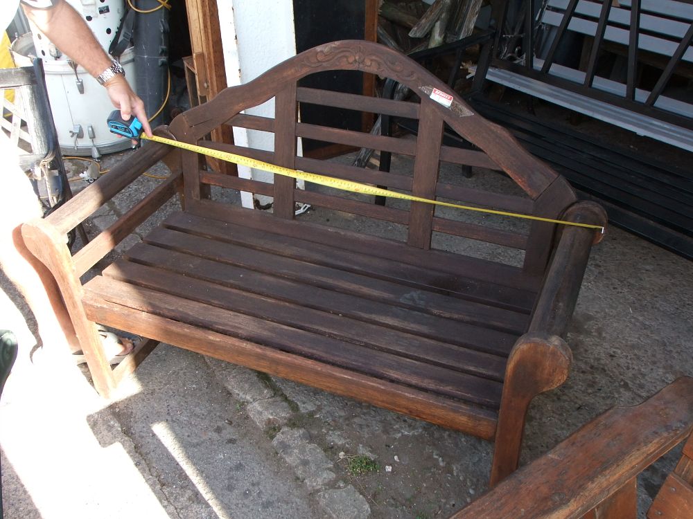 Lot 31: A Slatted Hardwood Garden Bench in the Lutyens Style