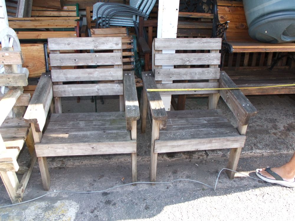 Lot 28: A Pair of Weathered Wooden Garden Armchairs