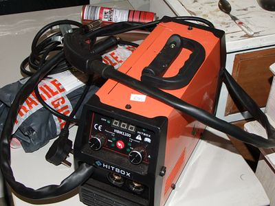 HITBOX HBM1200 Multi-Process 3-in-1 MIG MMA TIG Welding Machine. A HITBOX HBM1200 portable 
