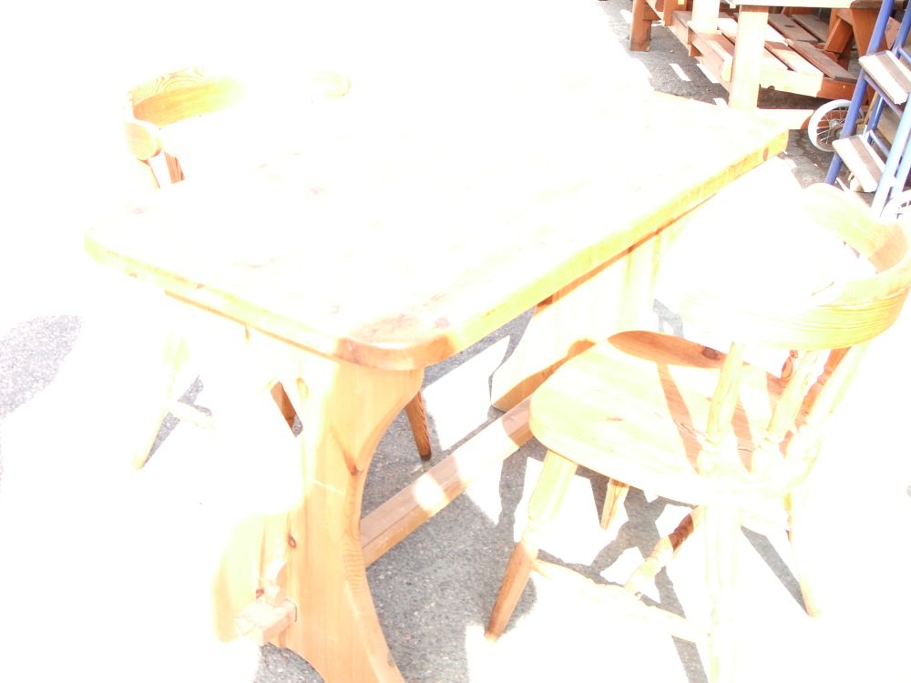 Lot 19: A Pine Trestle Dining Table and a Pair of Matching Spindle Back Chairs