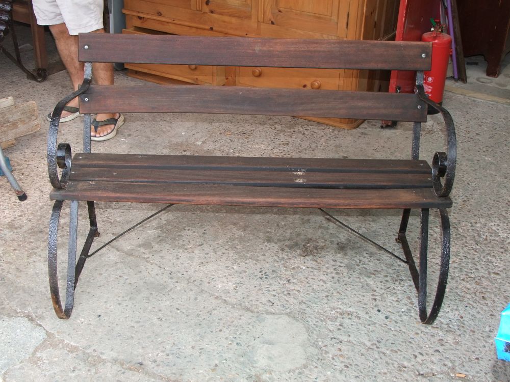 Lot 18: A Wrought Iron and Slatted Wood Garden Bench