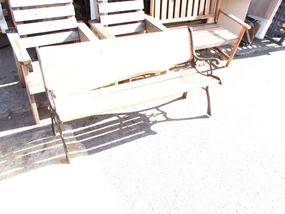 Lot 13: A Live Edge Wood and Cast Iron Garden Bench