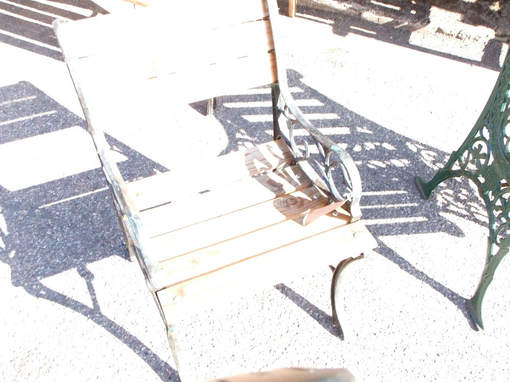 Lot 10: Child sized Victorian style cast iron and wood garden armchair