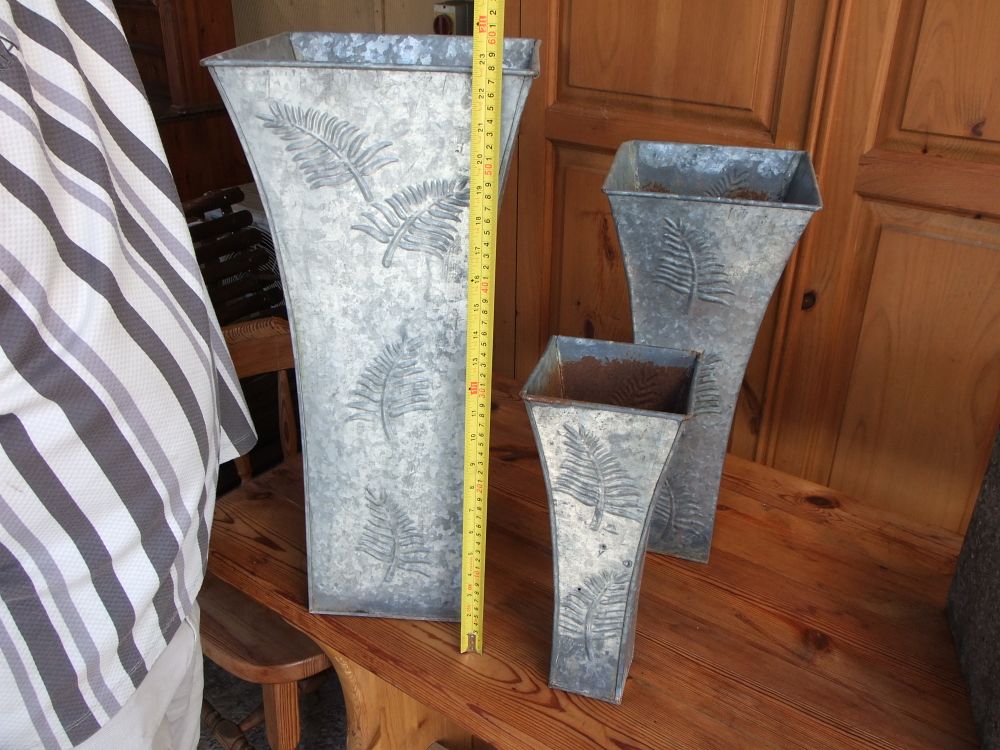 Lot 5: A Trio of Graduated Galvanised Zinc Tapered Garden Planters with Fern Motif