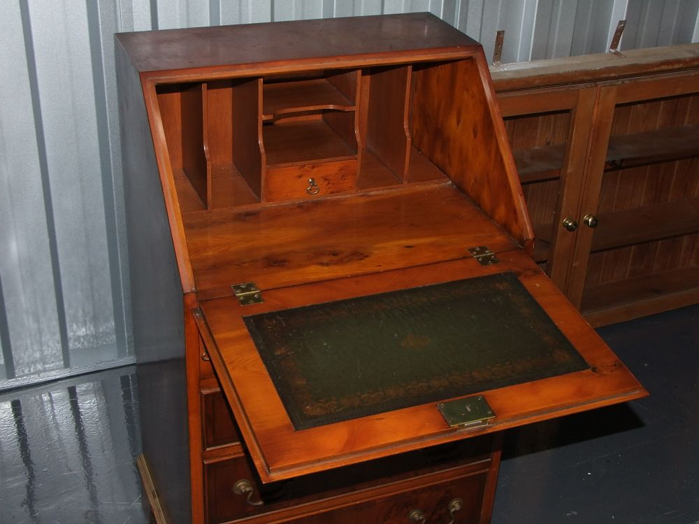 Lot 2: A George III style yew wood secretary bureau