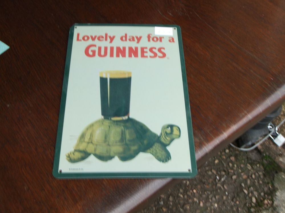 Lot 13: A Guinness Advertising Tortoise Enamelled Metal Wall Sign