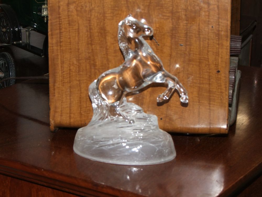 Lot 27: A clear and frosted glass rearing horse figurine