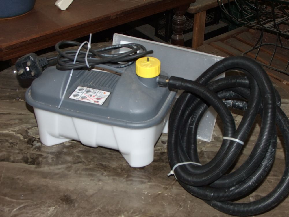 Lot 39: A portable electric steam wallpaper stripper