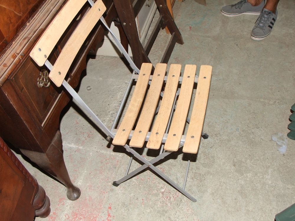 Lot 41: A contemporary folding bistro side chair