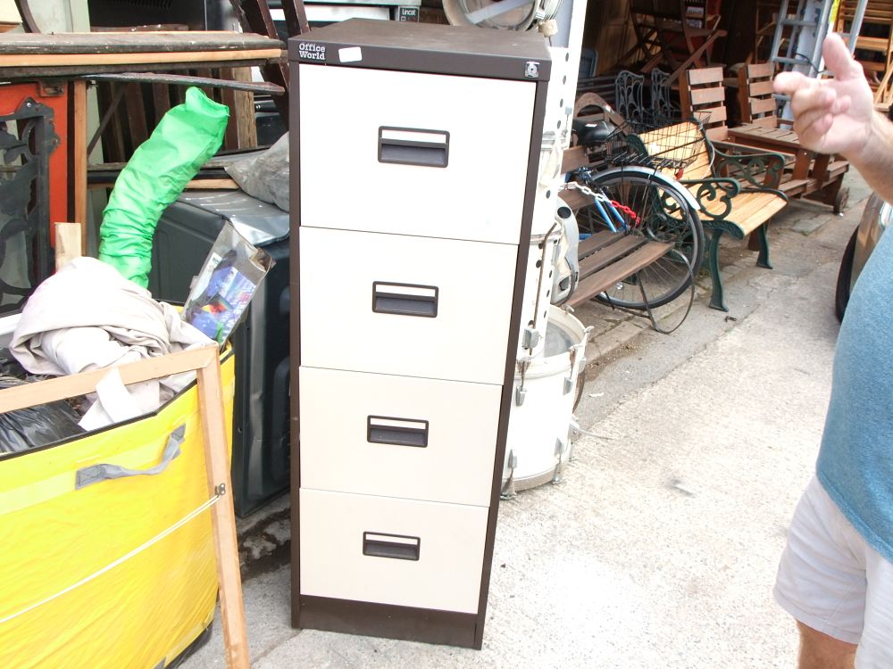 Lot 55: An Office World two-tone metal four-drawer filing cabinet
Missing key. No Reserve.