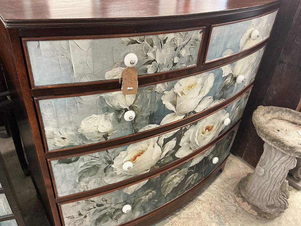 Lot 310: A Contemporary Upcycled Mahogany Bow-Front Chest of Drawers with Laura Ashley Floral Decoupage