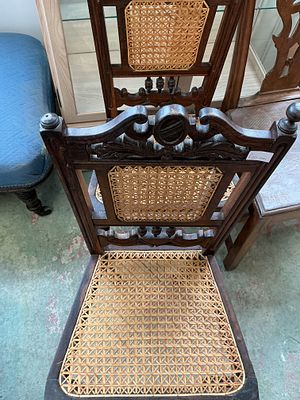 A Pair of Carolean Revival Carved Hardwood Side Chairs with Cane Panels