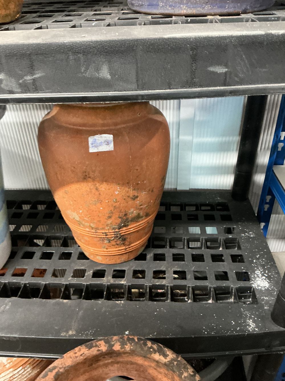 Lot 383: A Large Terracotta Olive Jar in the Turkish Style