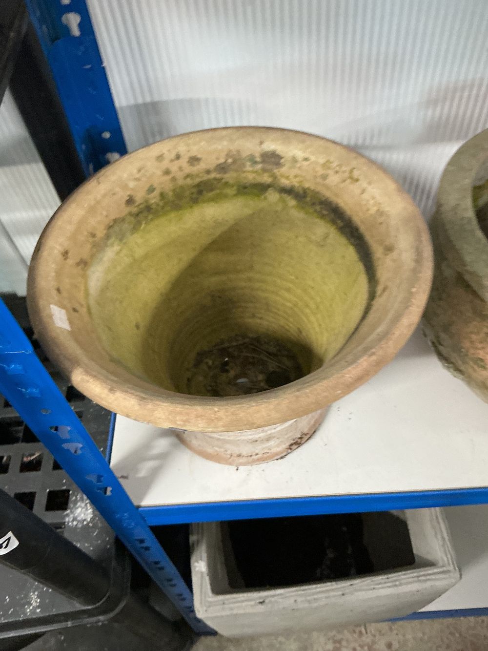 Lot 399: A Large Glazed and Weathered Terracotta Garden Pot in the French Biot Style