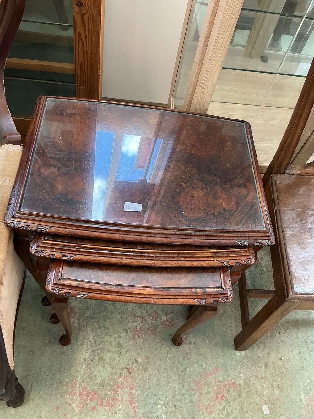 Lot 476: A Nest of Three Queen Anne Style Burr Walnut Tables