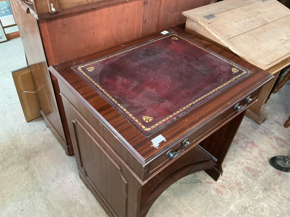 Lot 483: A Regency Style Mahogany Writing Desk with Inset Leather Top