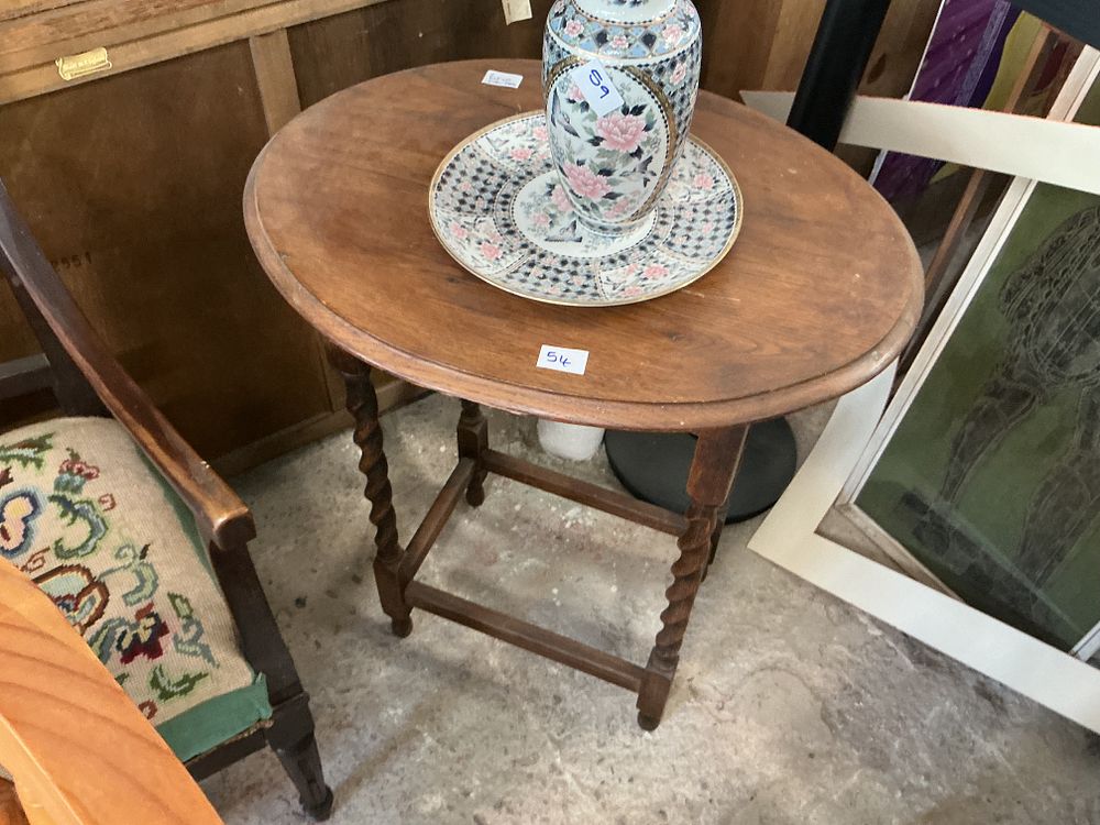Lot 485: An Early 20th Century English Oak Occasional Table in the Jacobean Revival Style