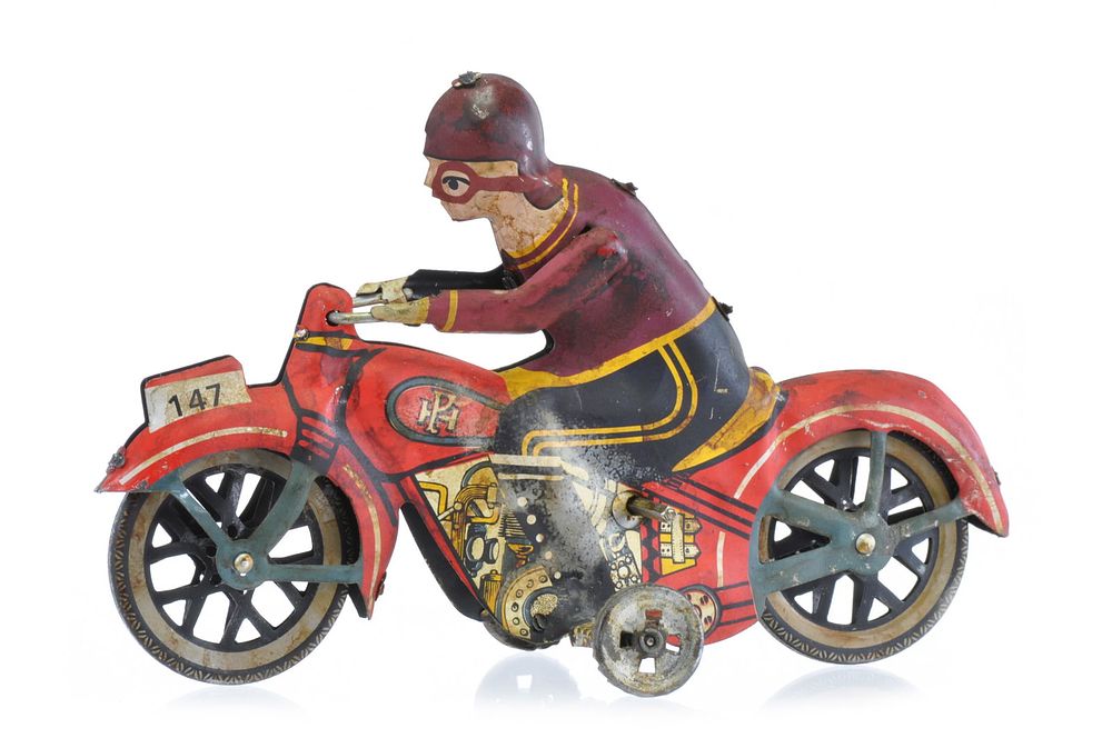 Lot 167: Paya Motorcycle 147 Tin Windup Toy