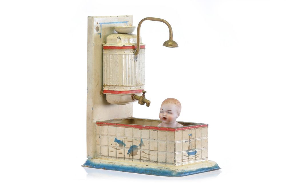 Lot 168: Early GoSo German Tin Bathtub with Overhead Shower & Porcelain Baby
